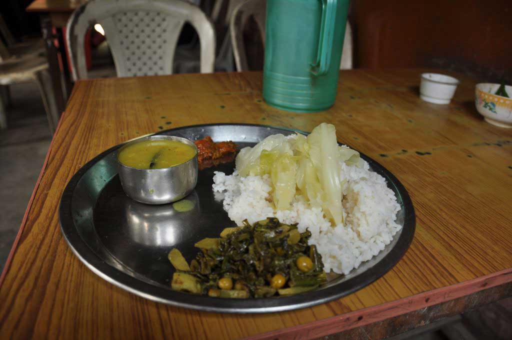 food at the "sumo" stand at Sonari, before start the trip to Mon. Assam