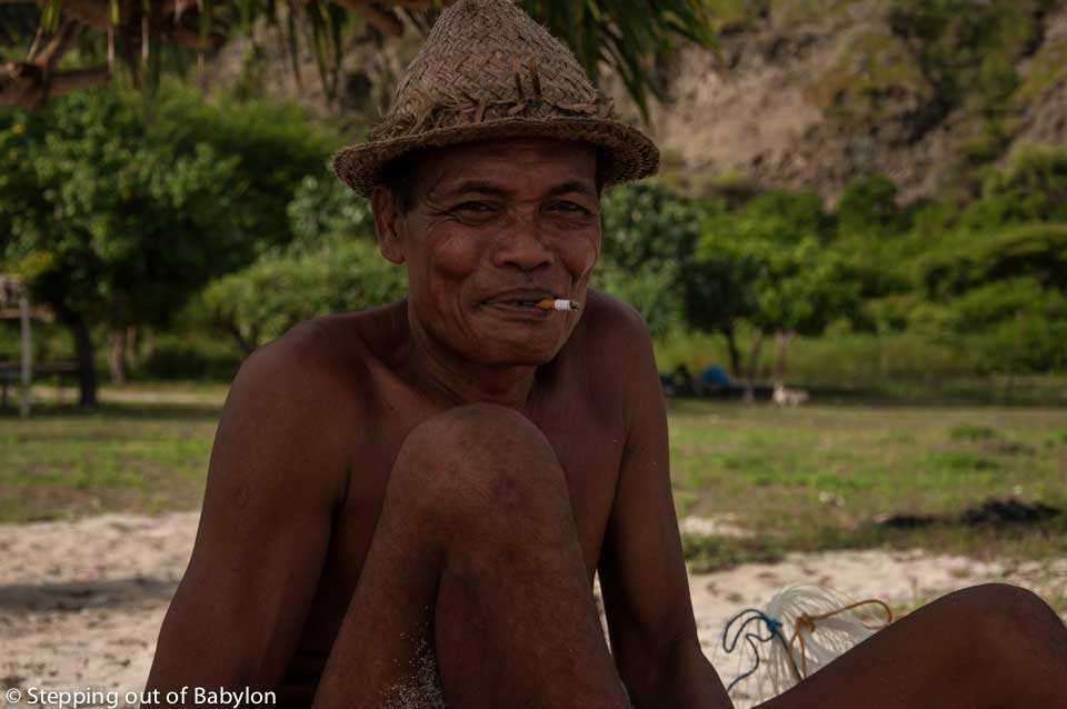 fisherman at Serenting beach. Kuta, Lombok