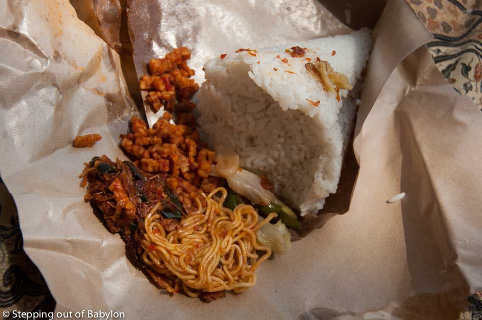 nasi campur for take away: rice, fry noodles, sweet fry tempeh