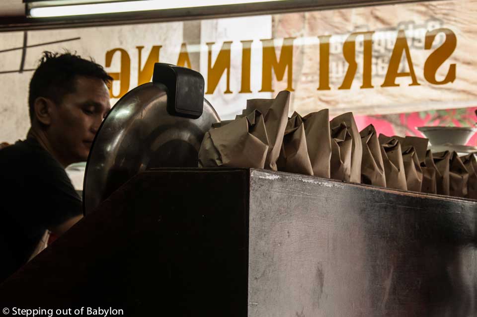 small eateries that are a bit everywhere in Indonesia that serve nasi campur, where the take away sytem is very popular, with the food wraped in paper sheets forming a cone